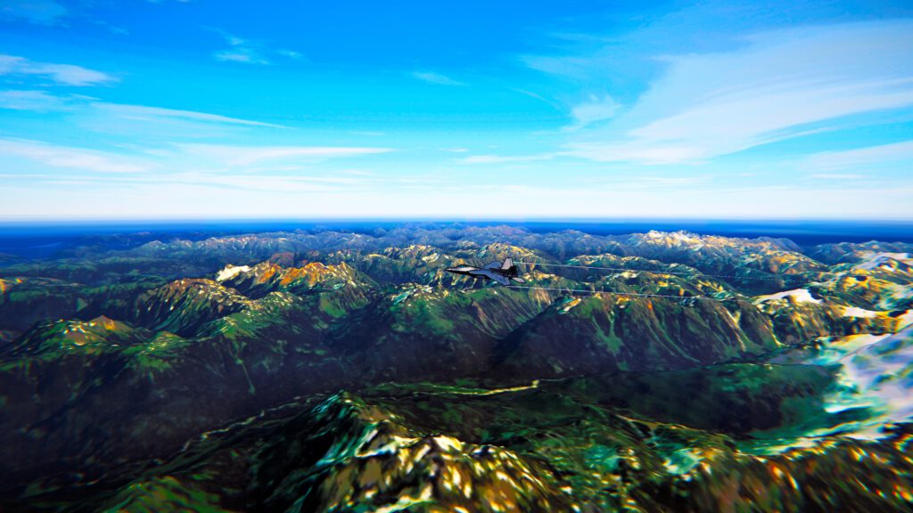 Wide panorama of a mountain range under a blue sky